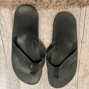 Men’s medium black rainbow flip flops